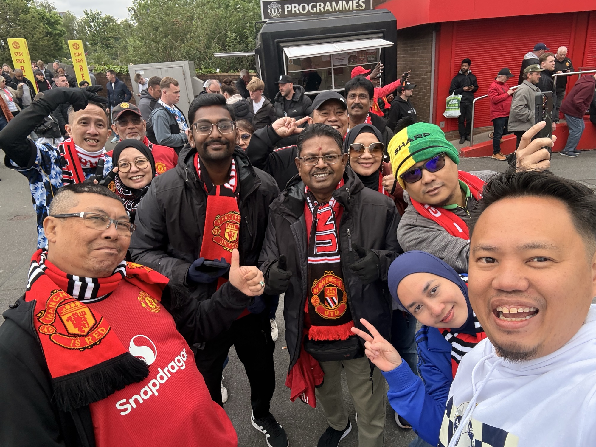 Matchday Affairs guests outside Old Trafford with Manchester United scarves